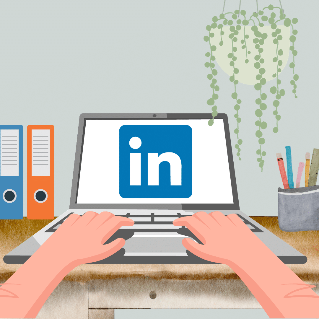 Laptop mit LinkedIn-Icon, an dem jemand tippt